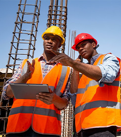 Hybrid Contracting Limited engineers reviewing plans on site